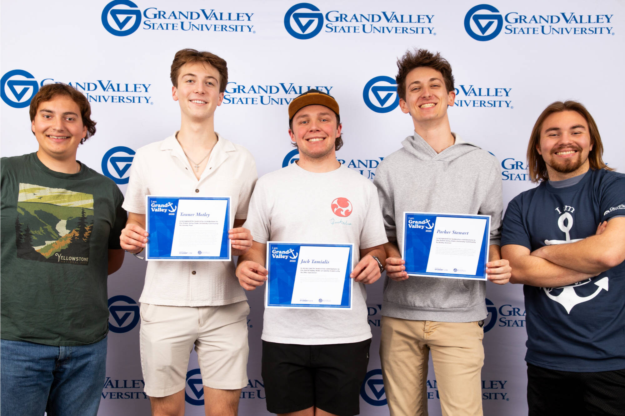 Students holding certificates
